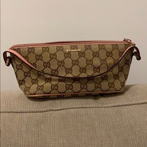 Real authentic Gucci pouch with pink strap
